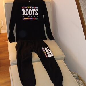 Roots Black Outfit with Flag Accents